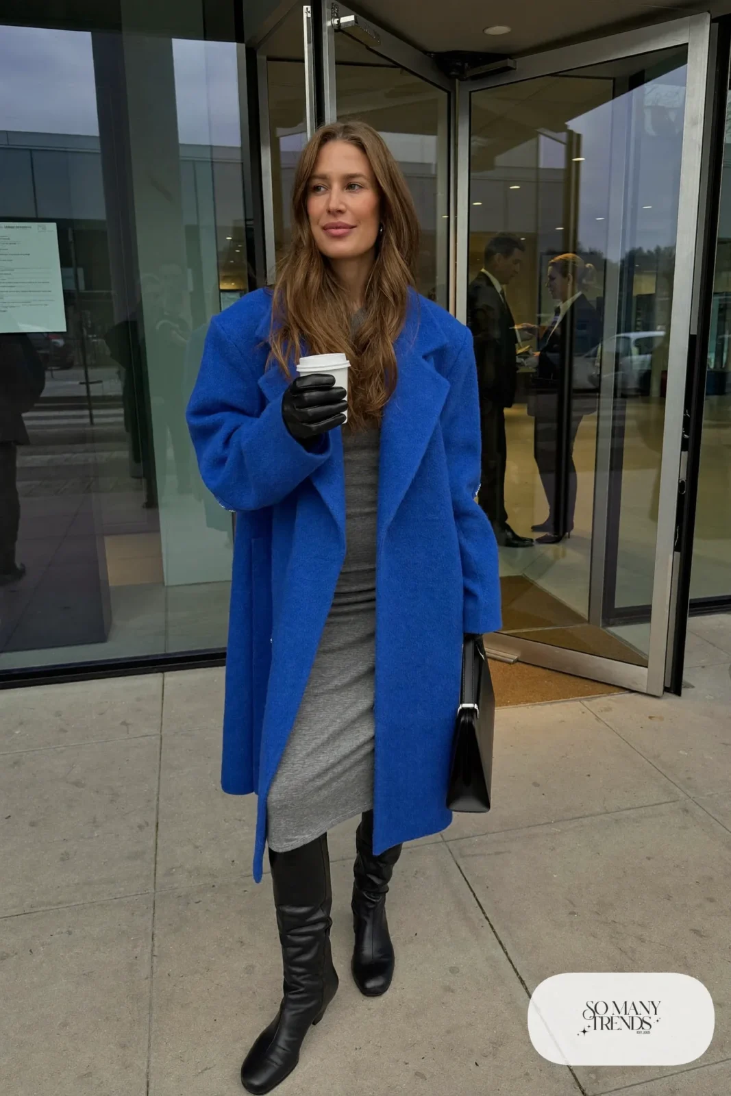 cobalt blue oversized wool coat gray knit midi dress black tall boots black leather gloves black bag outfit 20