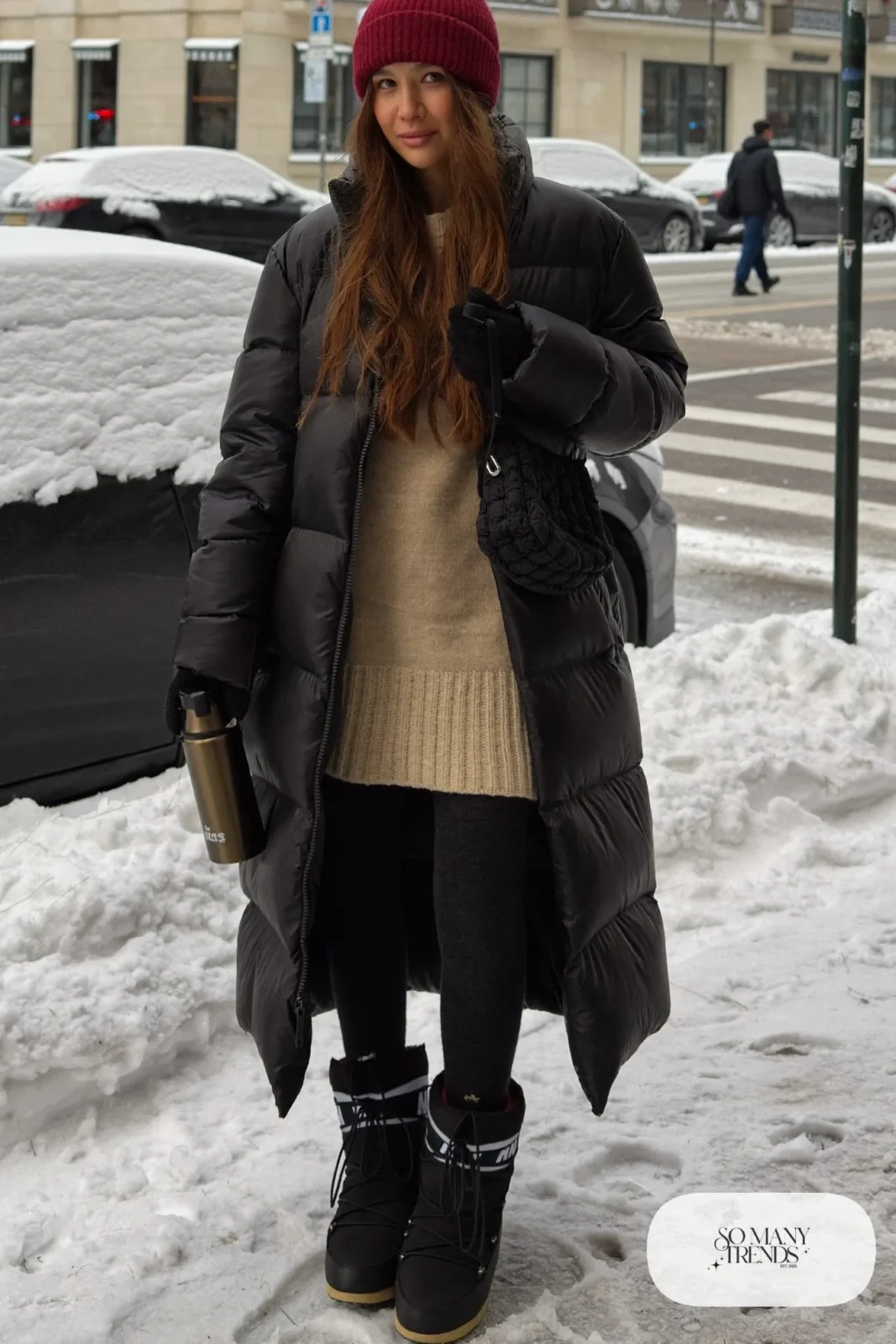 long black puffer coat beige knit sweater dress black snow boots burgundy beanie fleece tights crossbody bag outfit 23