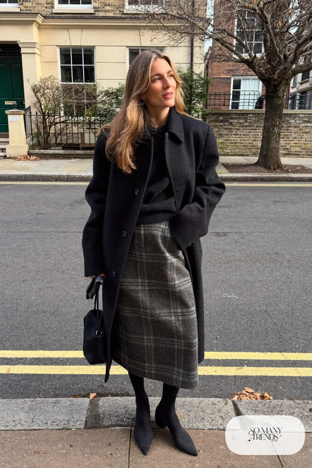 long black wool coat gray plaid wool midi skirt black thin sweater black tall boots opaque tights black bag outfit 26