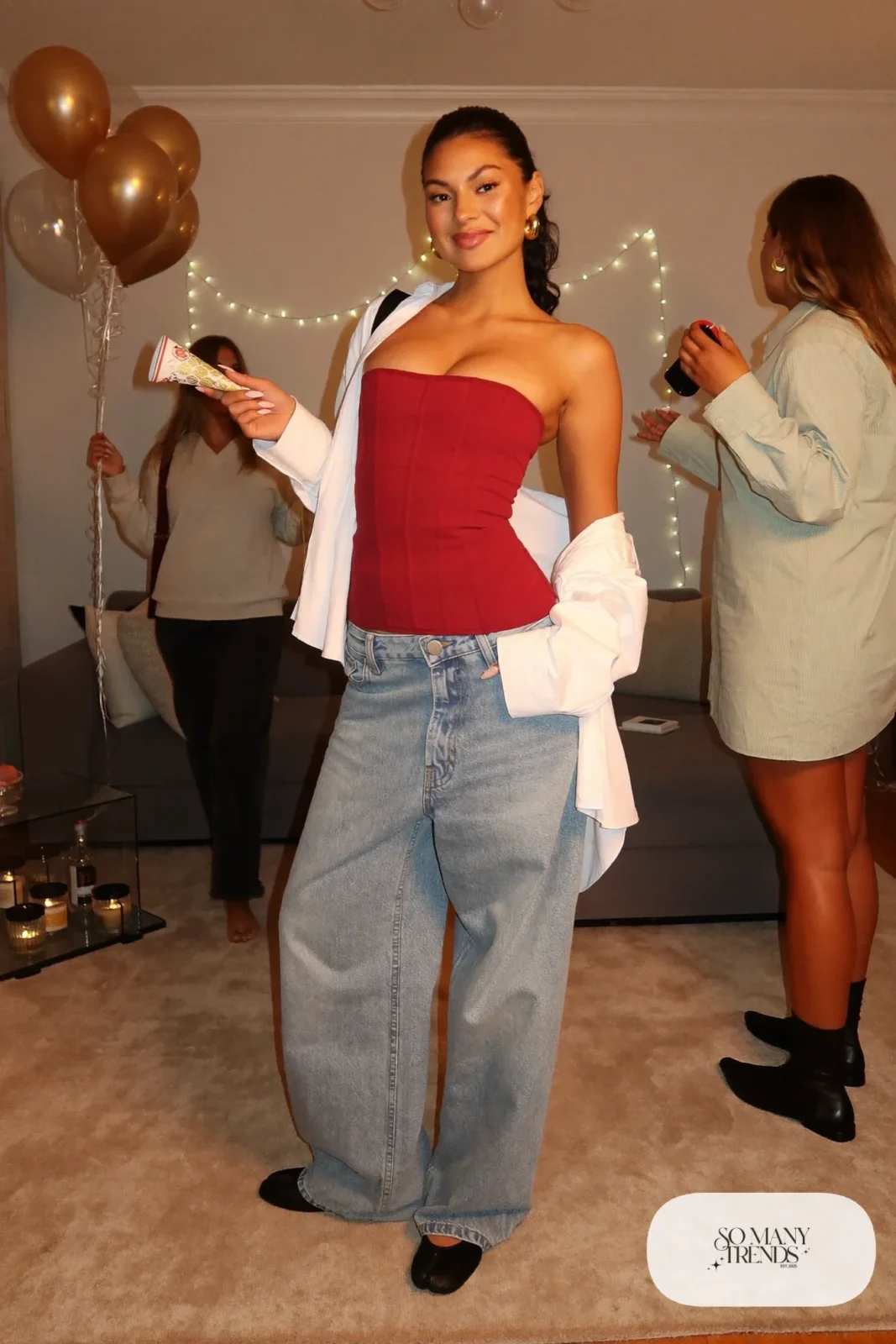 cherry red corset top wide-leg jeans white oversized open shirt black ankle-strap flats outfit 5