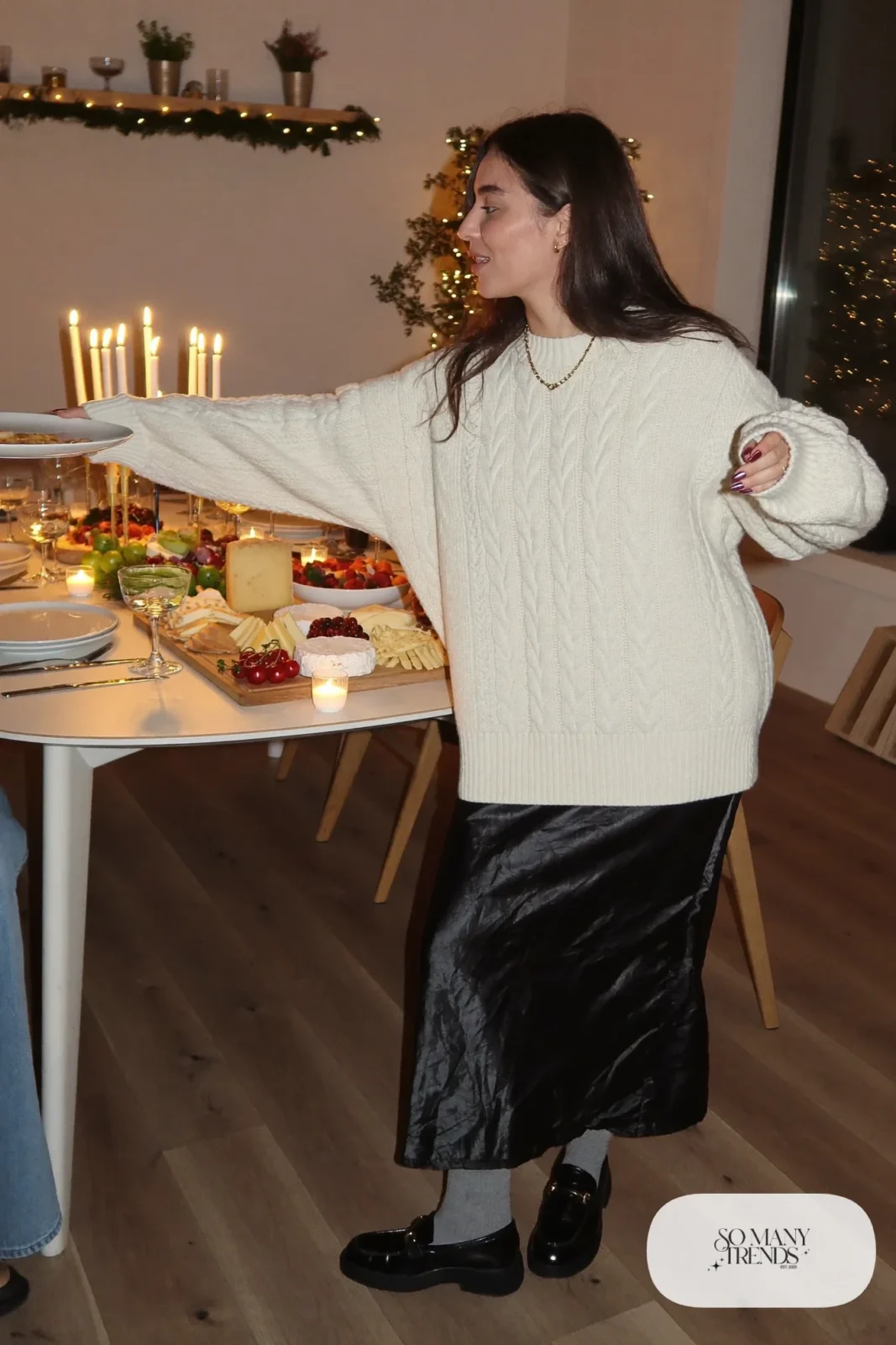 cream cable knit sweater black satin midi skirt black loafers gray socks outfit 7