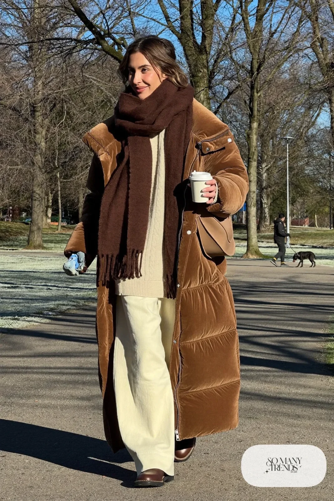 camel puffer coat cream wide leg pants cream knit sweater brown leather boots chocolate scarf tan bag outfit 30