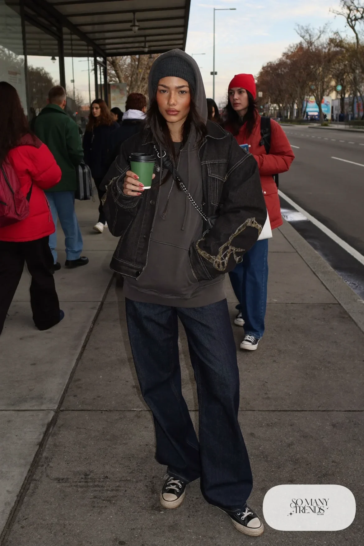 faded black denim jacket over gray hoodie baggy dark jeans worn sneakers outfit 19
