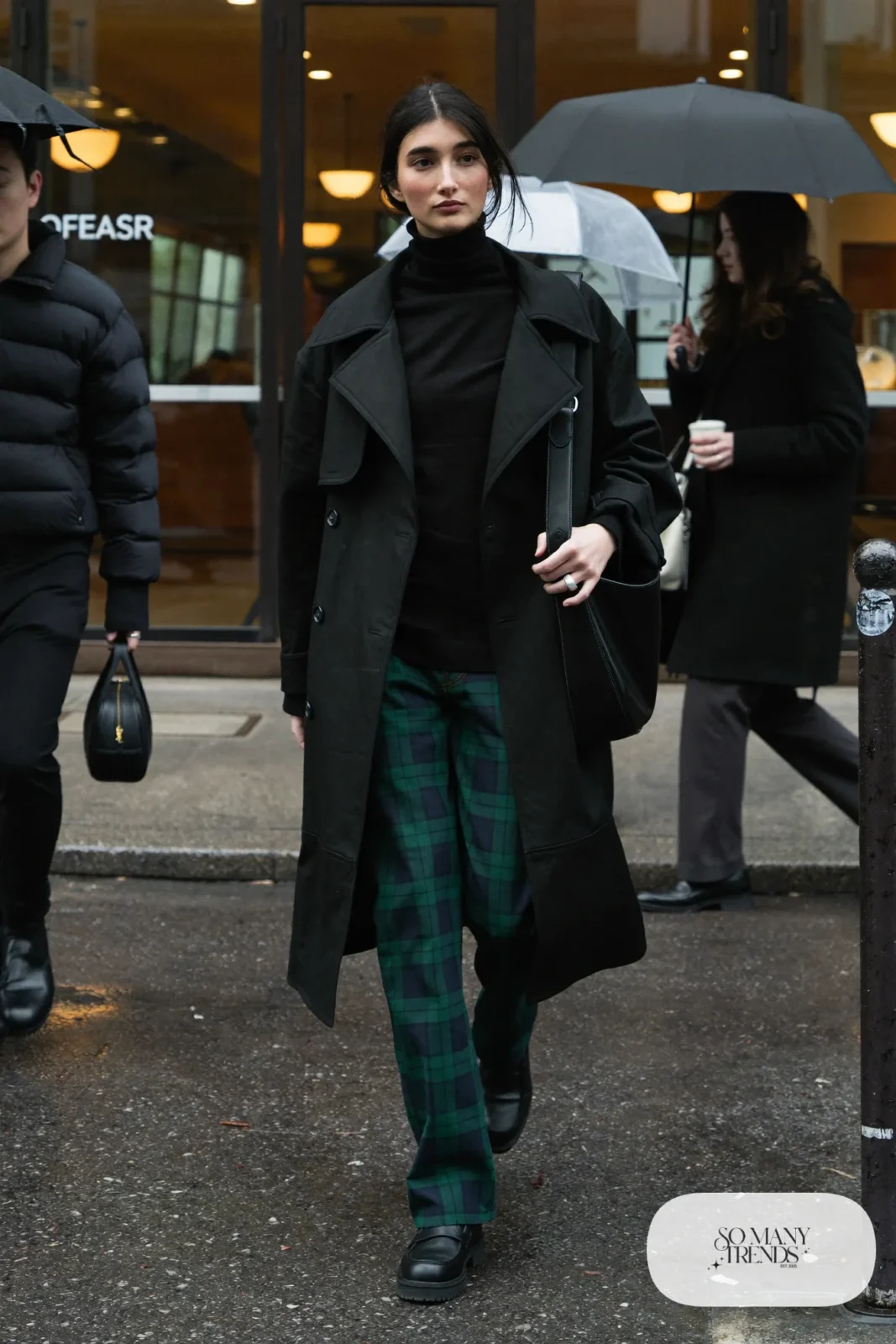 long black trench coat green plaid straight pants black turtleneck black loafers outfit 26
