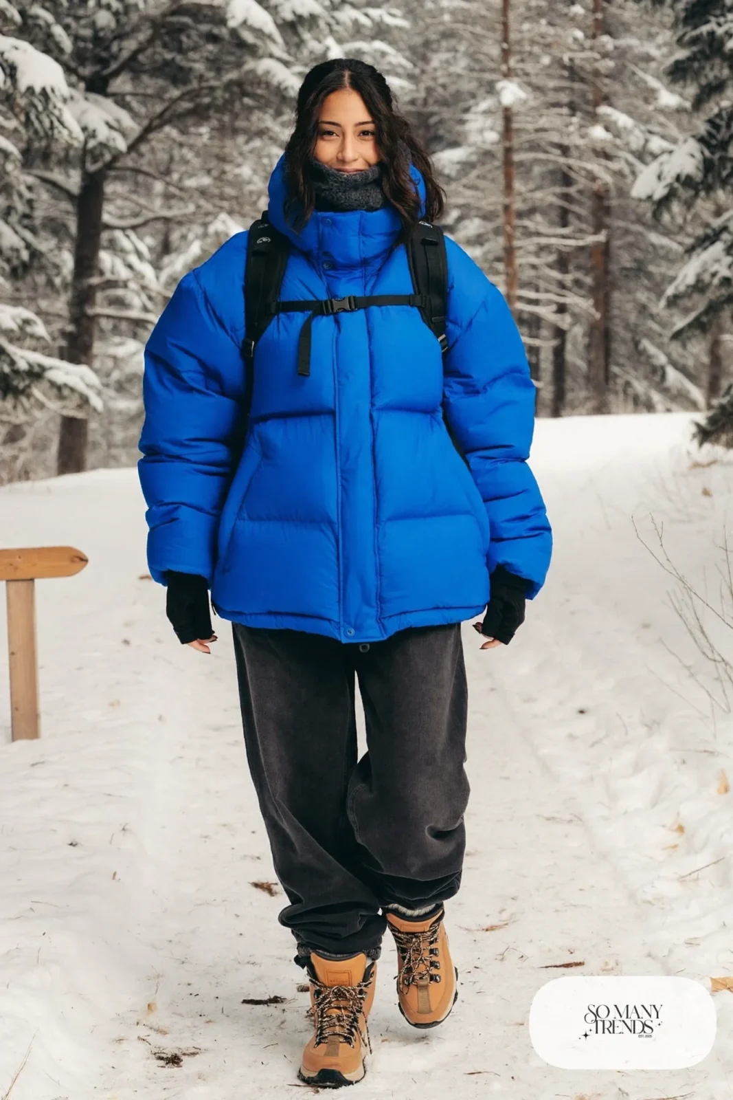cobalt blue boxy down jacket black jeans thermal leggings fleece neck gaiter waterproof hiking boots gloves outfit 22