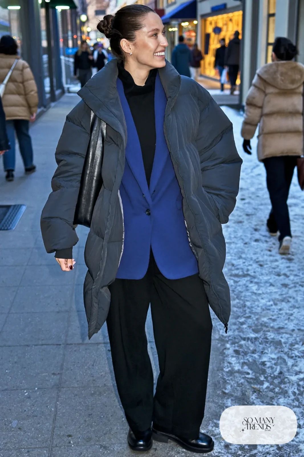 cobalt blue wool blazer long gray puffer coat black wide-leg wool pants turtleneck lug-sole boots tote bag outfit 29