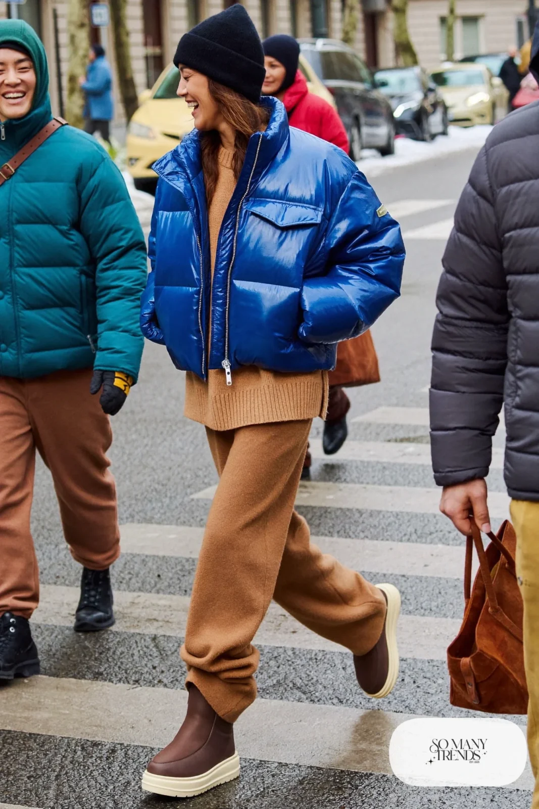 cobalt blue puffer jacket camel merino sweater camel wool pants chunky boots beanie outfit 3