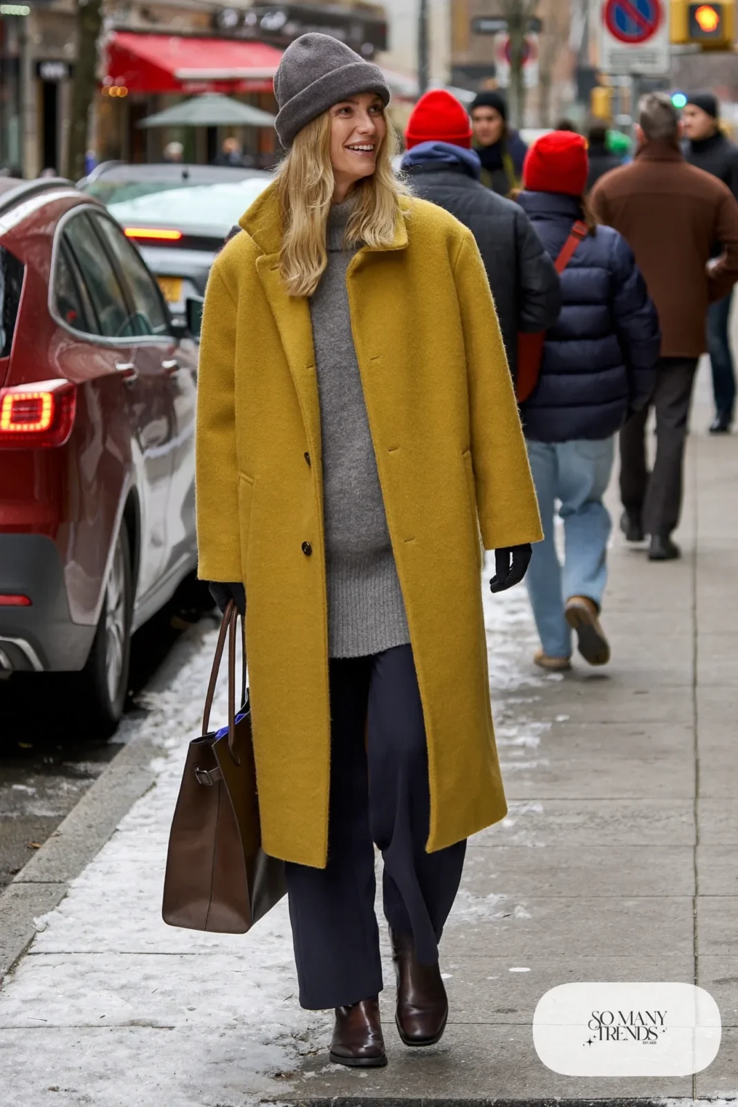 mustard yellow long wool coat gray ribbed turtleneck navy wide-leg pants brown boots wool hat outfit 11