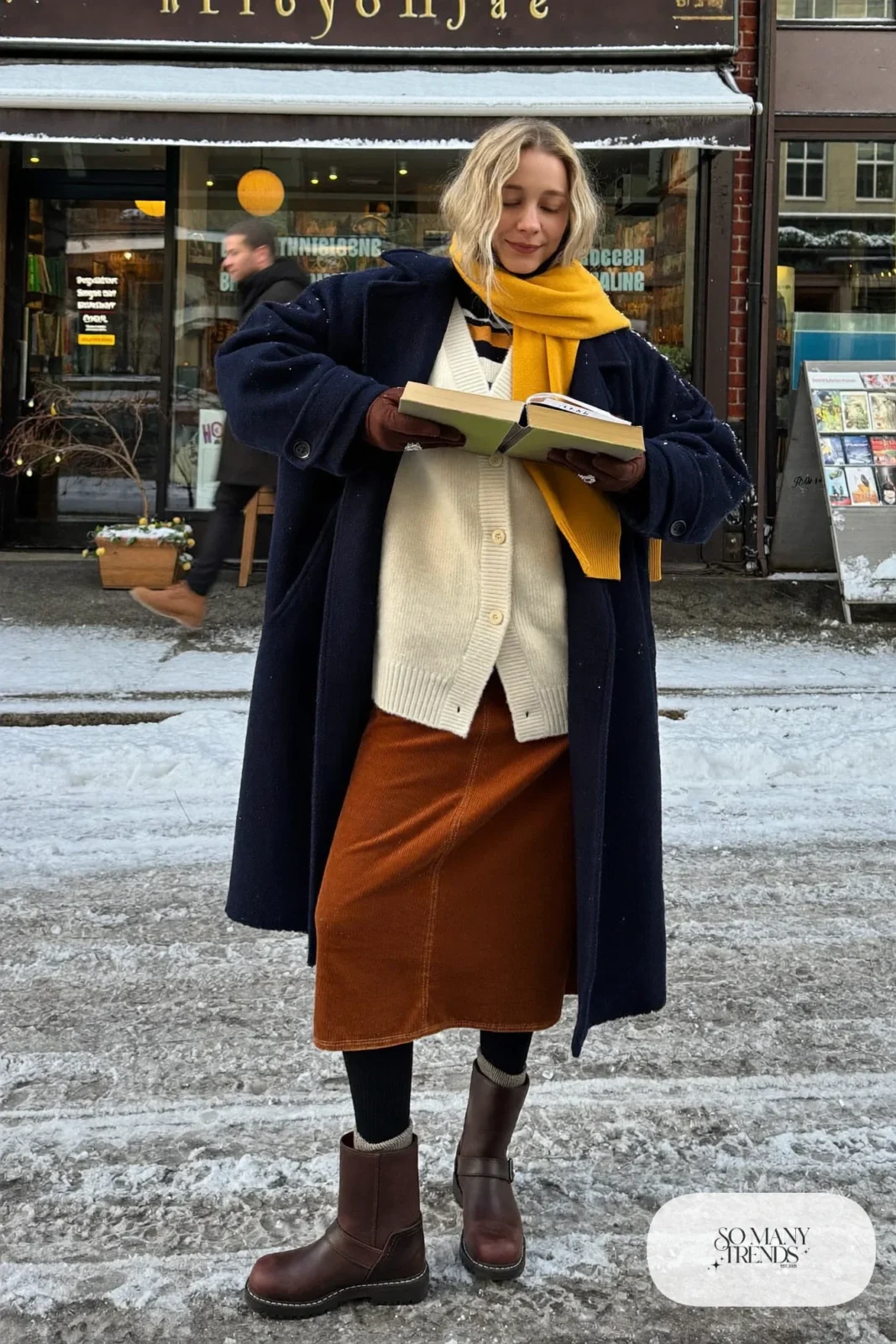 rust corduroy midi skirt cream chunky cardigan navy long coat thermal leggings brown boots outfit 21