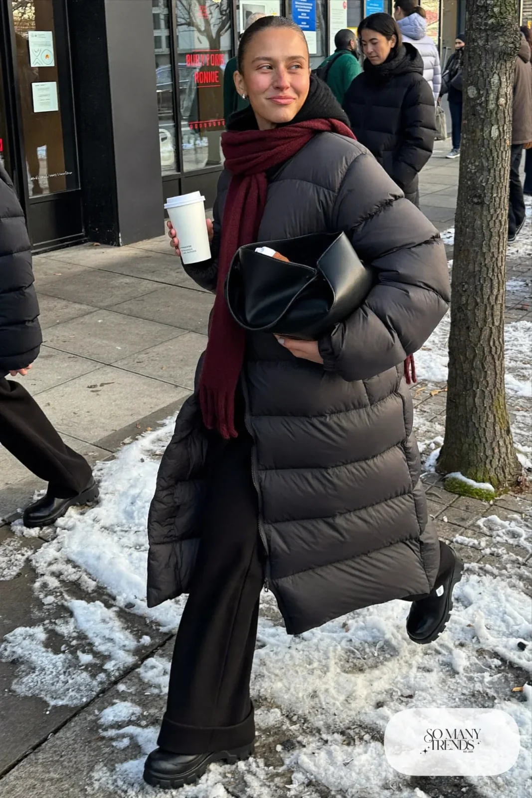 charcoal long puffer coat black sweater black wool pants burgundy scarf waterproof boots large tote outfit 27