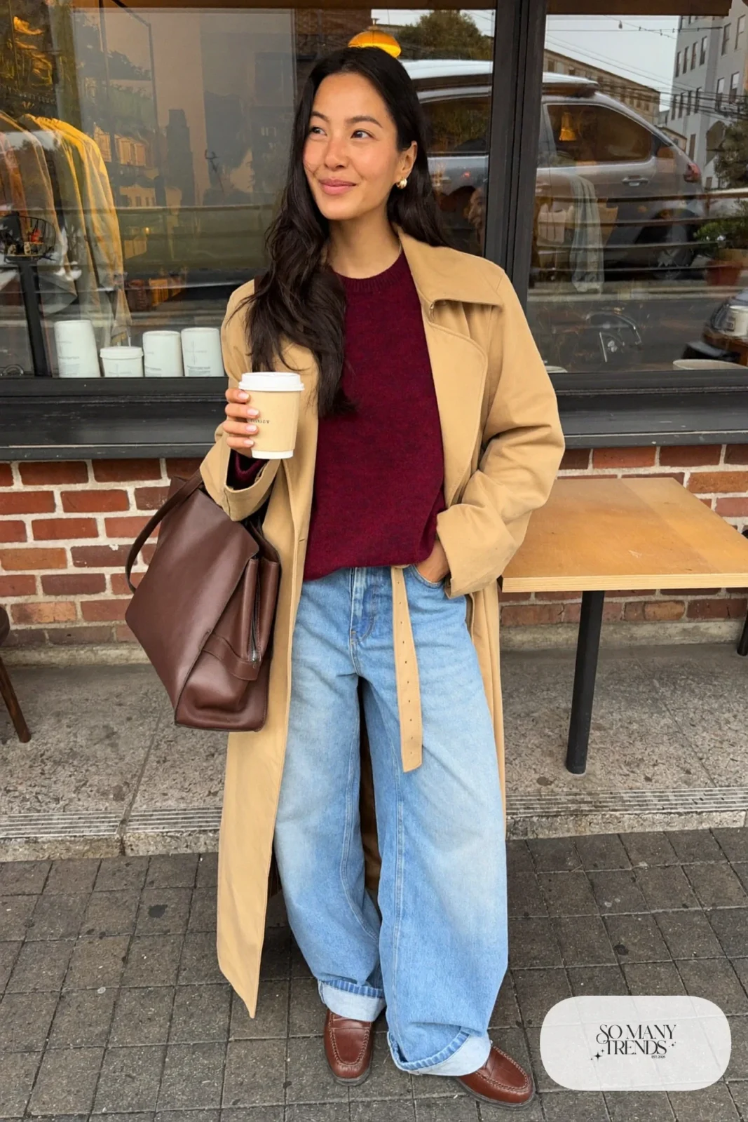 camel trench coat burgundy knit sweater wide-leg jeans brown loafers leather tote outfit 7