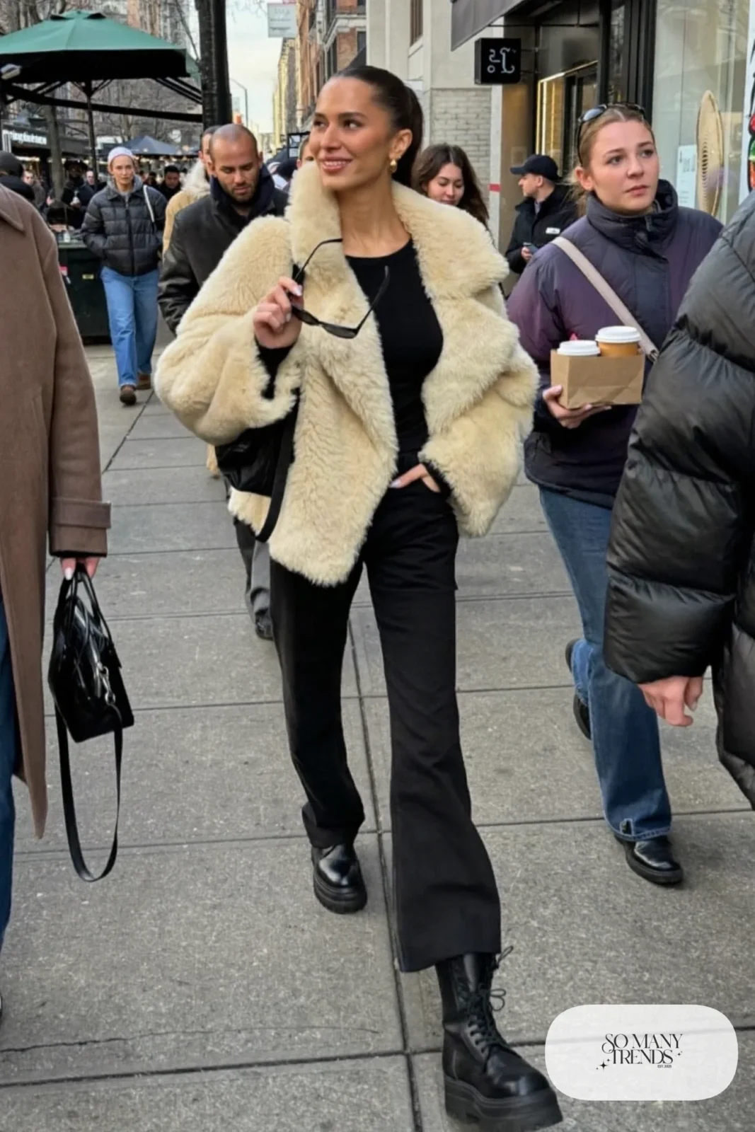 cream faux shearling jacket black tee black straight jeans black combat boots crossbody bag outfit 8