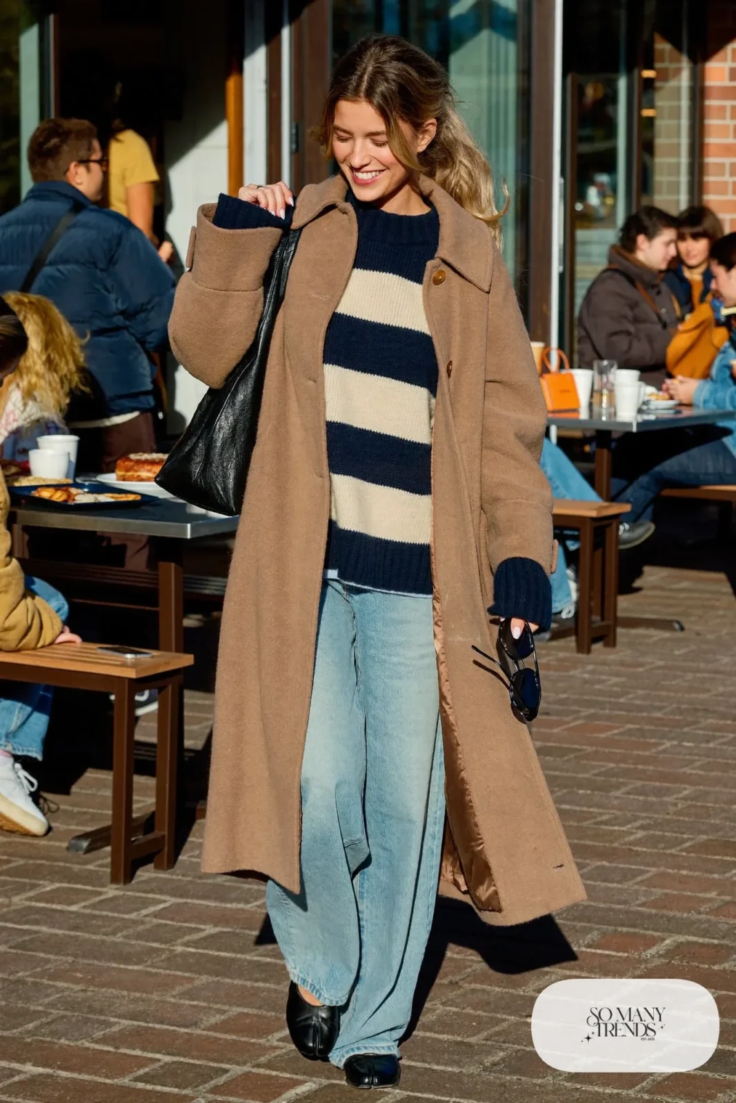 long camel wool coat striped sweater wide-leg jeans ballet flats shoulder bag outfit 19