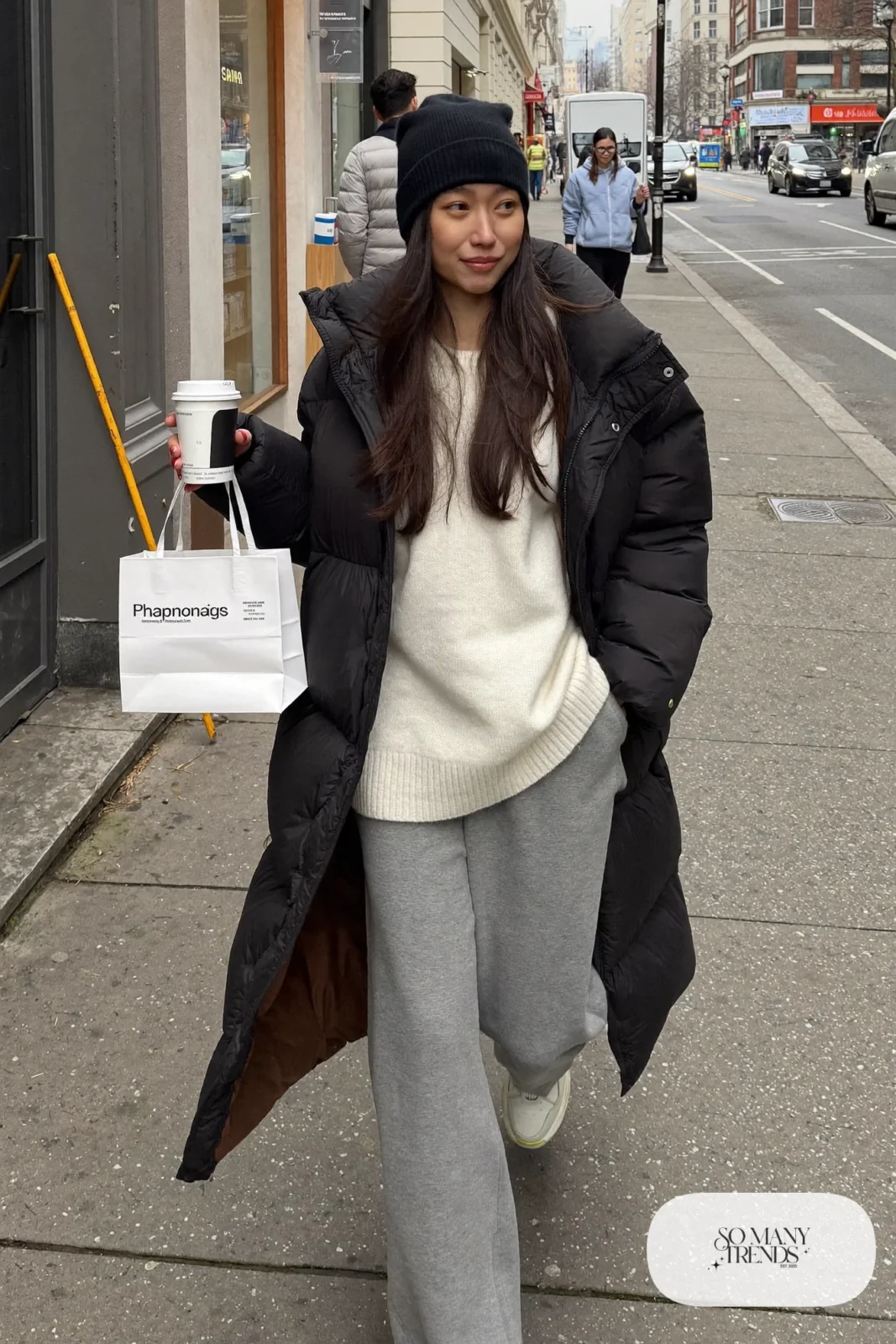 wide-leg gray sweatpants longline black puffer jacket cream sweater white sneakers beanie outfit 26