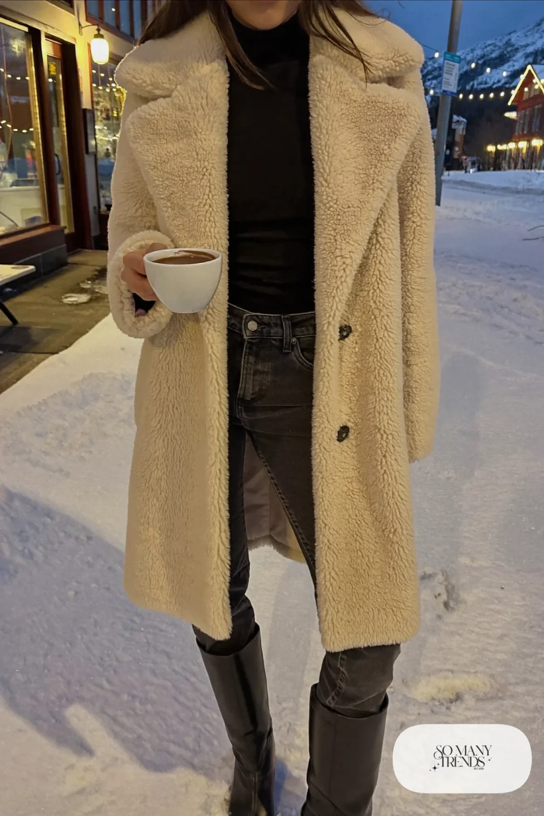 oversized cream faux shearling coat black turtleneck dark jeans black boots outfit 8