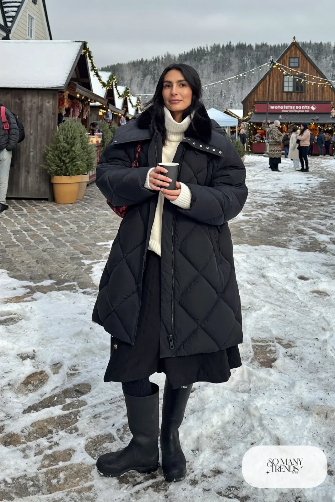 quilted black midi skirt chunky cream sweater fleece tights tall boots parka outfit 12