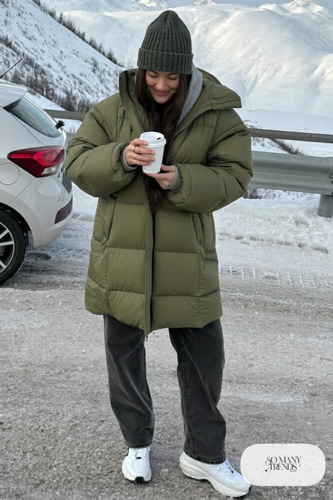 oversized gray hoodie olive parka black jeans sneakers beanie outfit 21