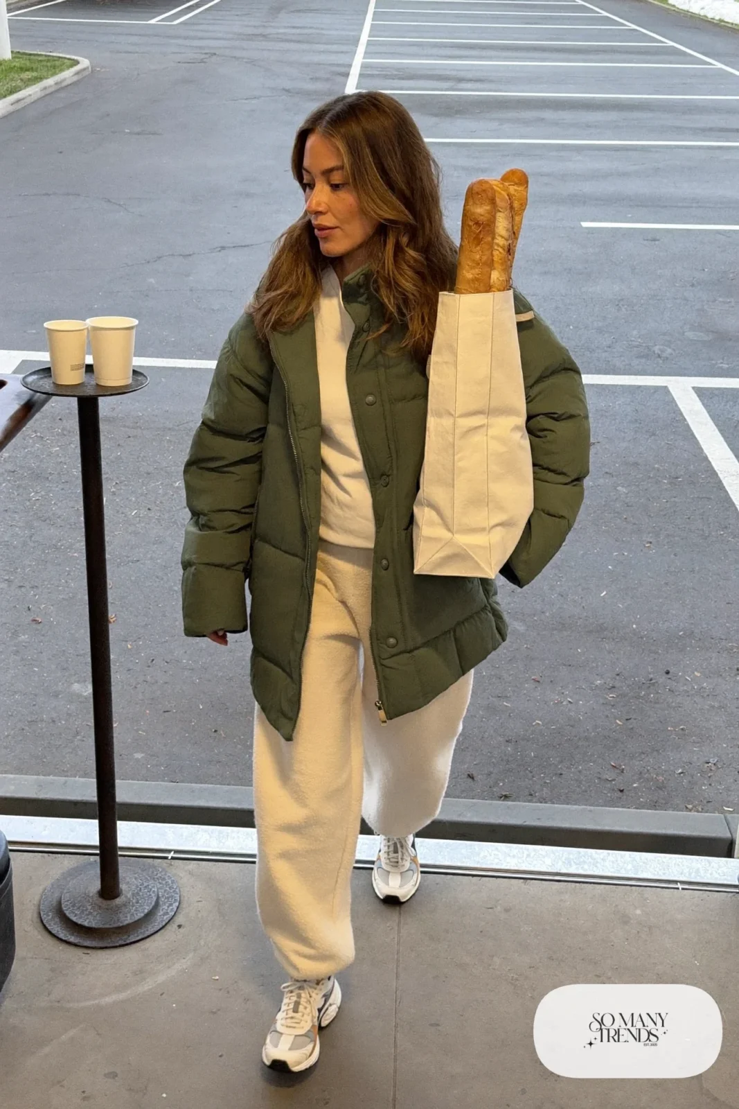 forest green boxy quilted jacket cream joggers white tee chunky sneakers outfit 3
