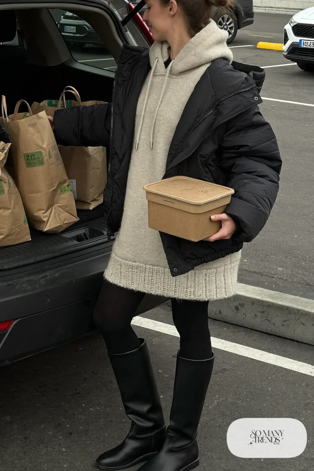 oatmeal oversized hoodie dress black tights knee-high boots black puffer jacket outfit 18