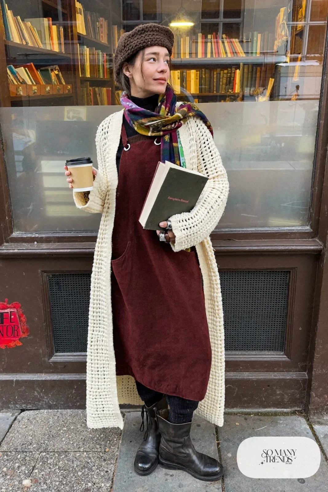 cream long crochet cardigan burgundy corduroy pinafore dress black turtleneck tights ankle boots outfit 8