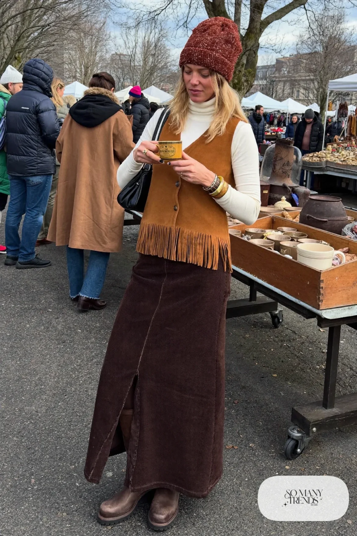 chocolate corduroy maxi skirt tan suede fringe vest cream turtleneck brown boots beanie outfit 16