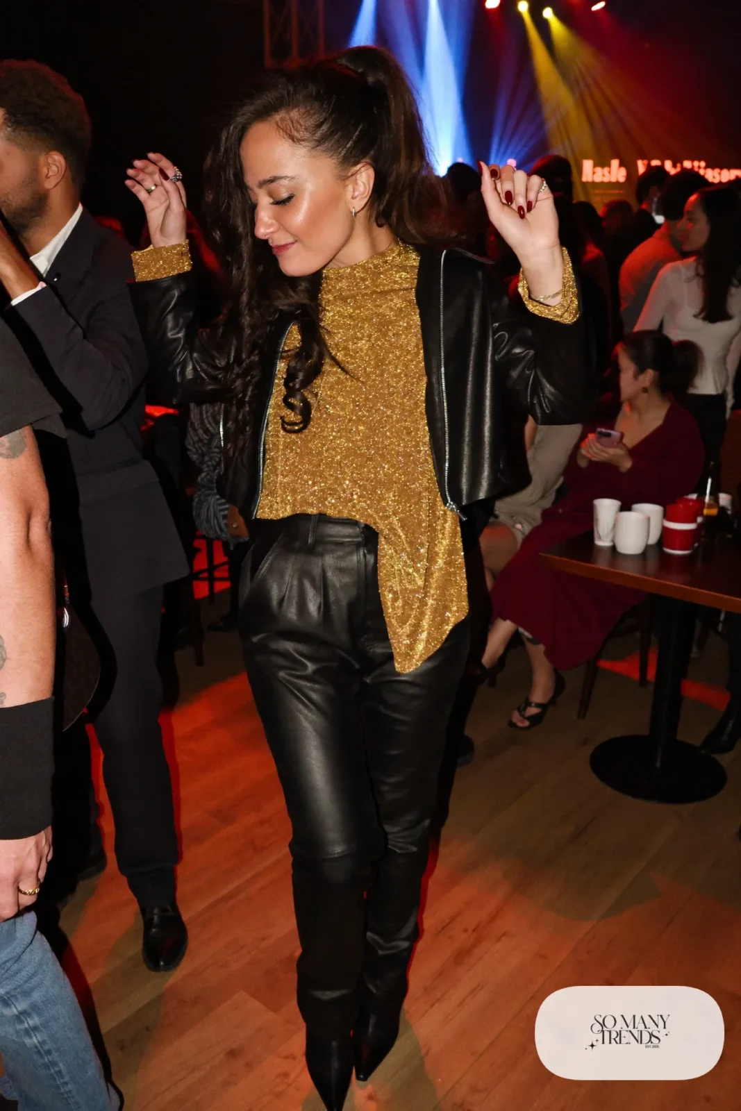 black faux leather pants gold glitter top cropped black jacket black pointed boots nashville outfit 5