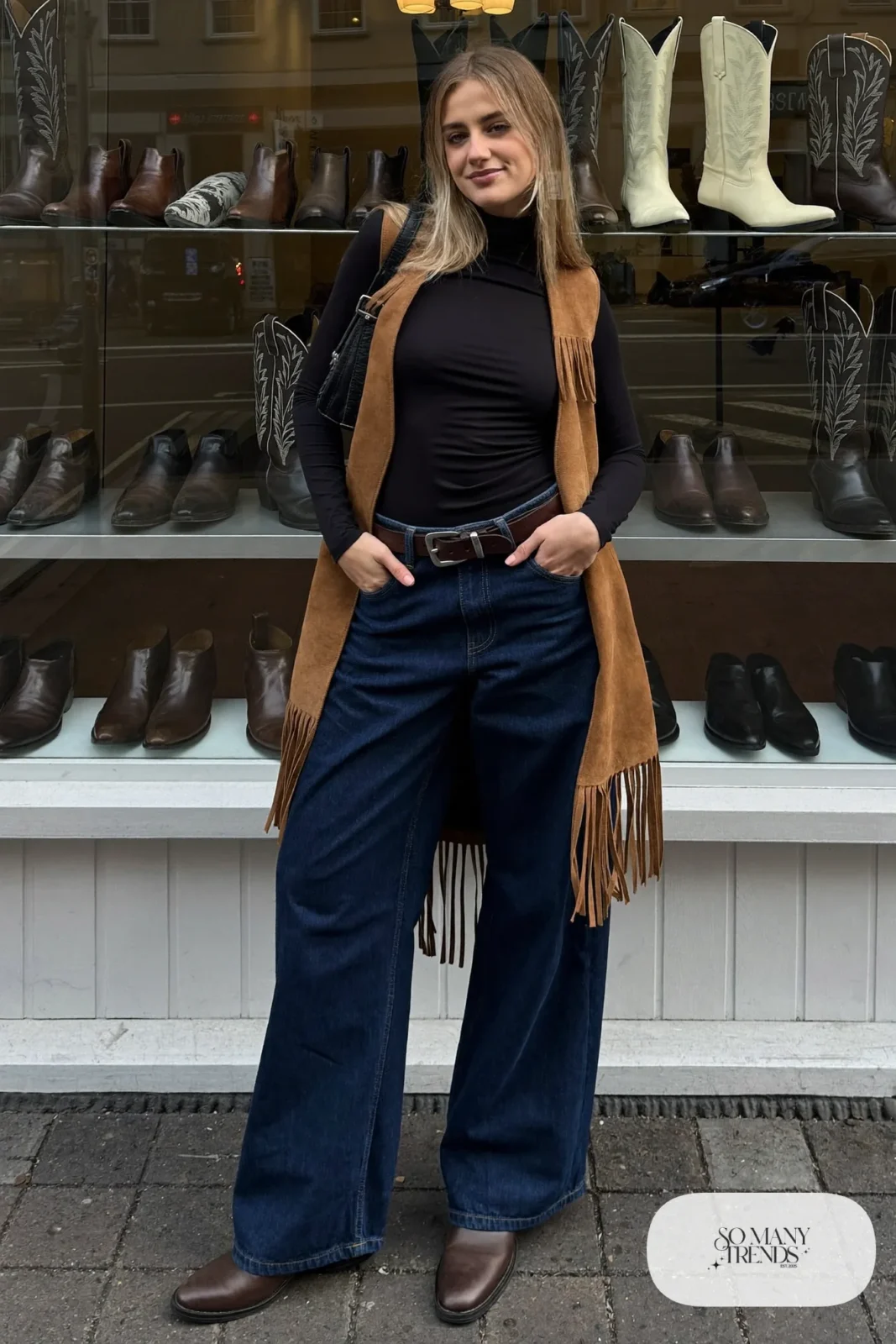 tan suede fringe vest black fitted turtleneck wide leg jeans brown boots nashville outfit 10