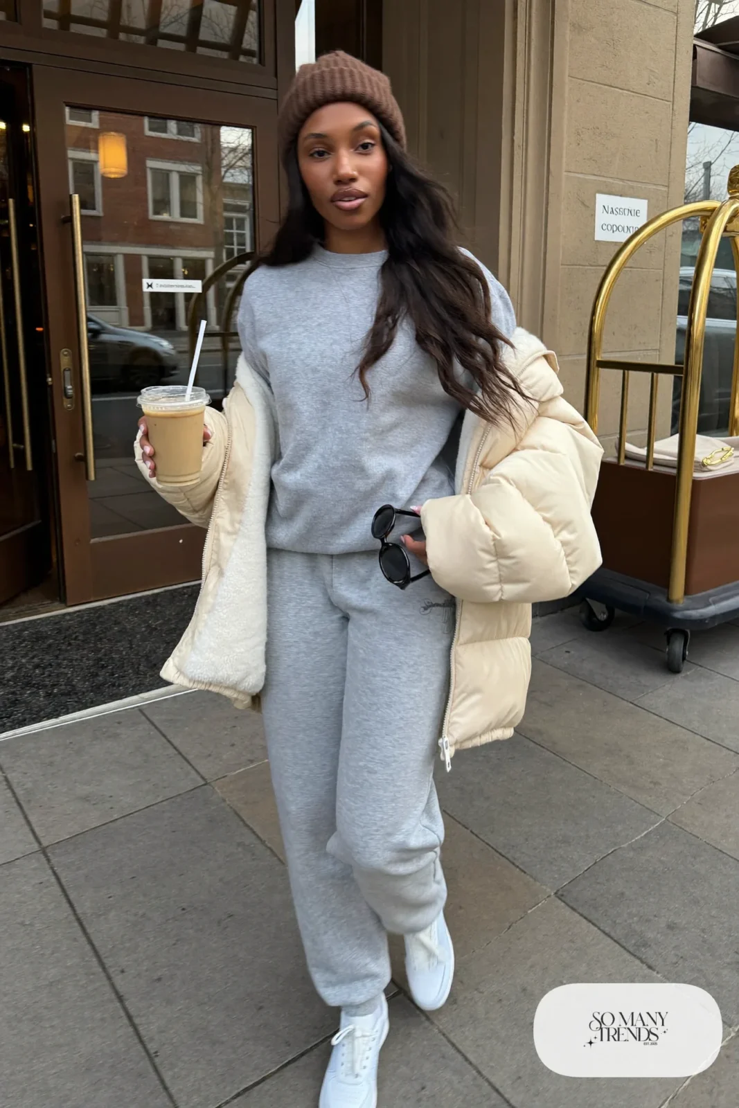 gray heathered sweatshirt jogger set oversized cream puffer jacket white sneakers beanie nashville outfit 31