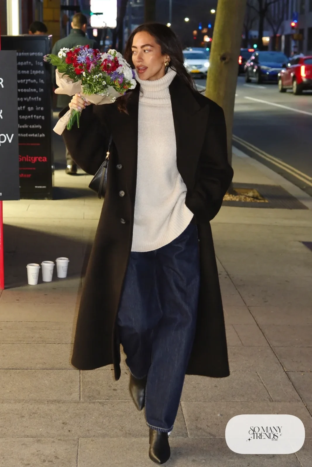 cream turtleneck, long black wool coat, dark jeans, black heeled boots, small hoops, shoulder bag outfit 19