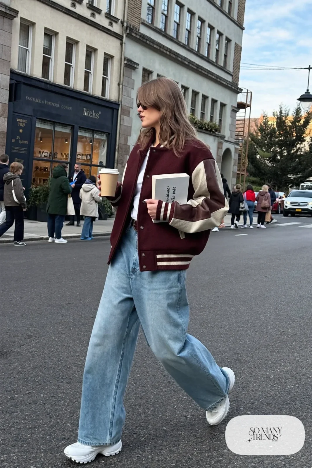 burgundy and cream varsity jacket, white tee, wide-leg light-wash jeans, chunky white sneakers outfit 26