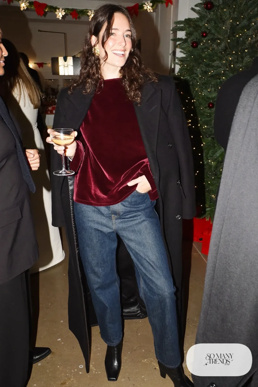 burgundy velvet top, dark straight jeans, black heeled boots, statement earrings, black wool coat outfit 31