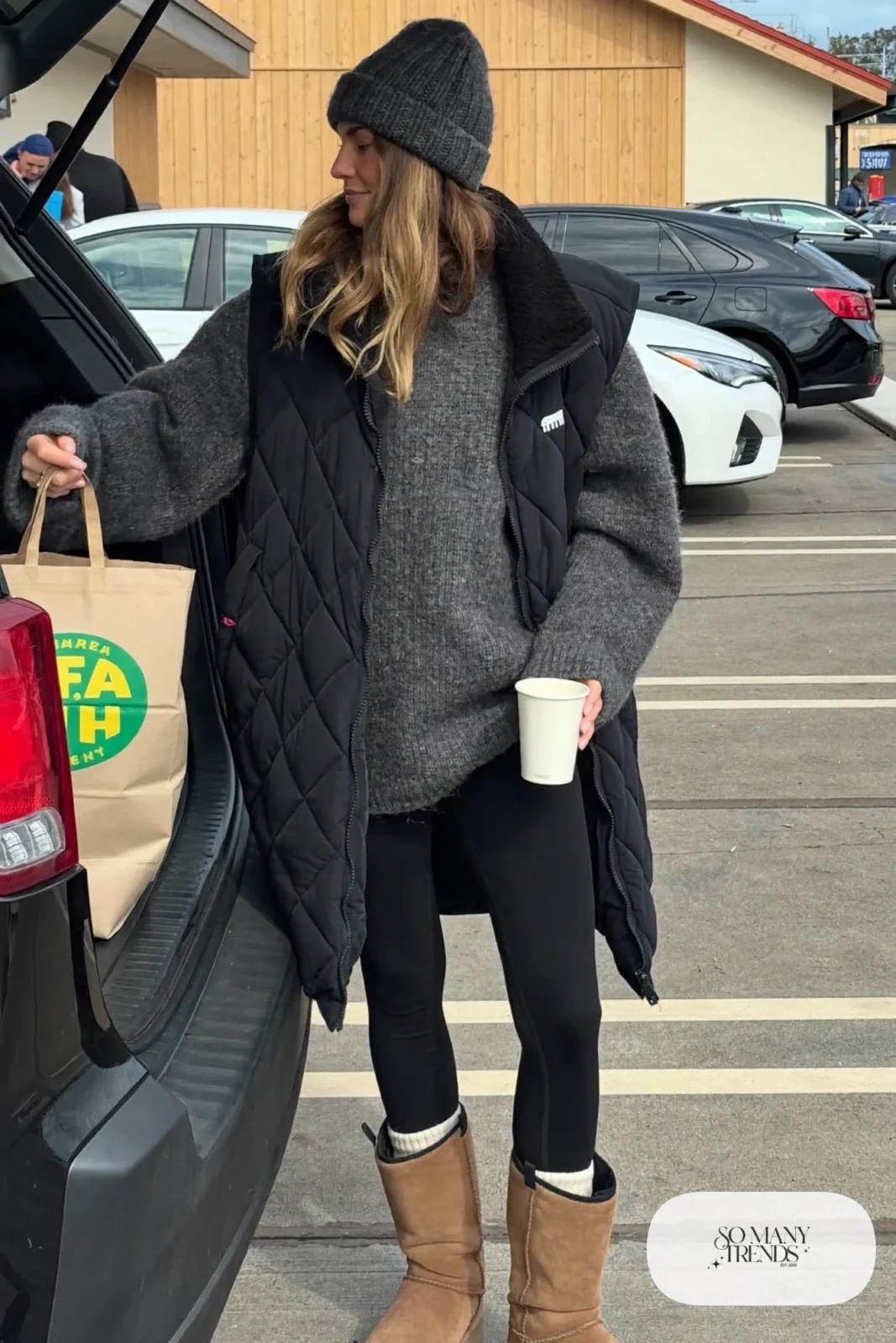 charcoal marl long sweater fleece lined black leggings puffer vest duck boots outfit 4