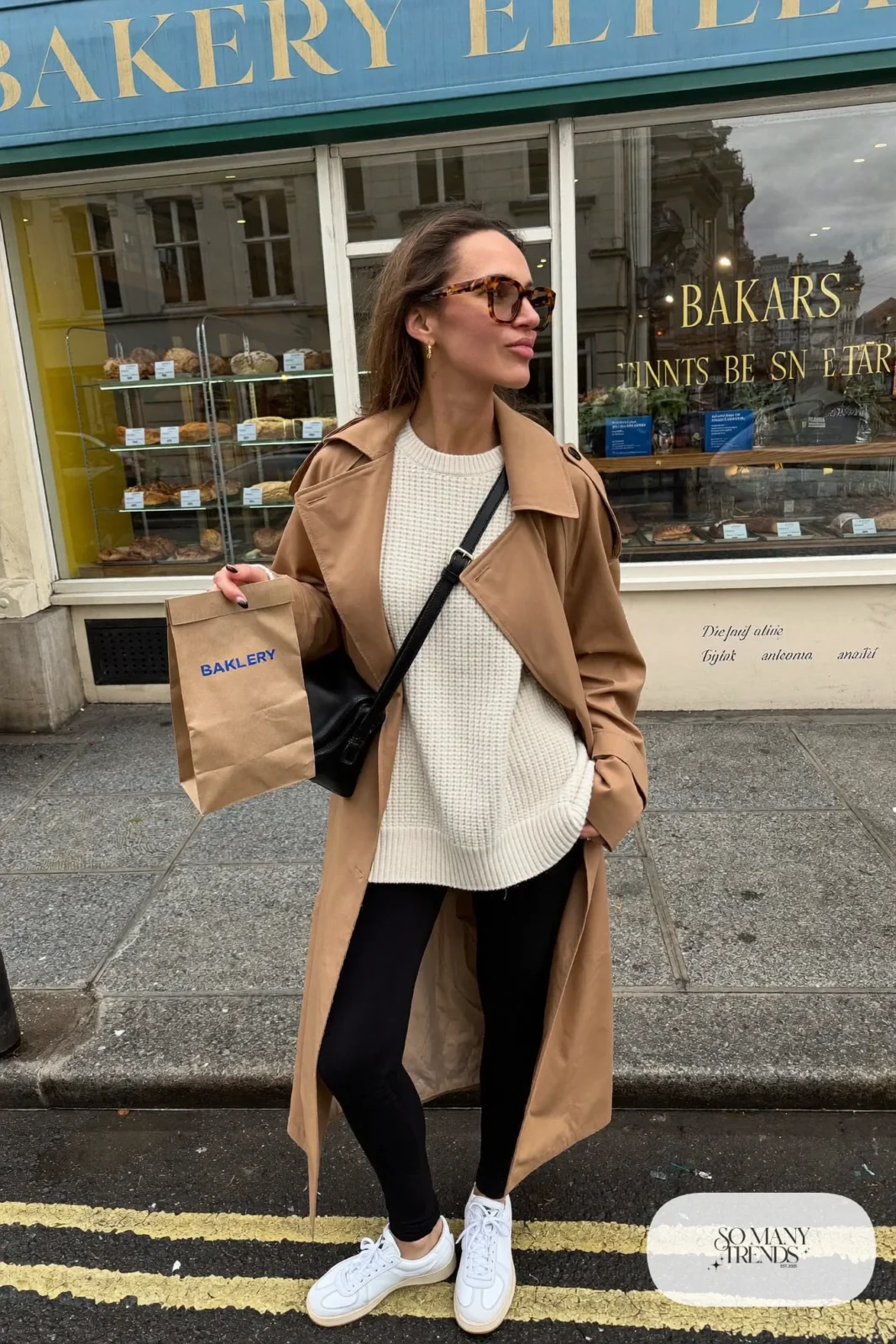 cream waffle knit long sweater black leggings belted trench coat white sneakers outfit 6