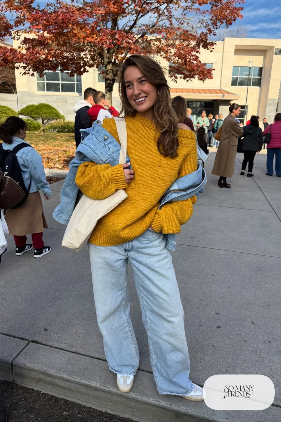 mustard yellow long sweater wide leg light wash jeans white sneakers canvas tote outfit 8