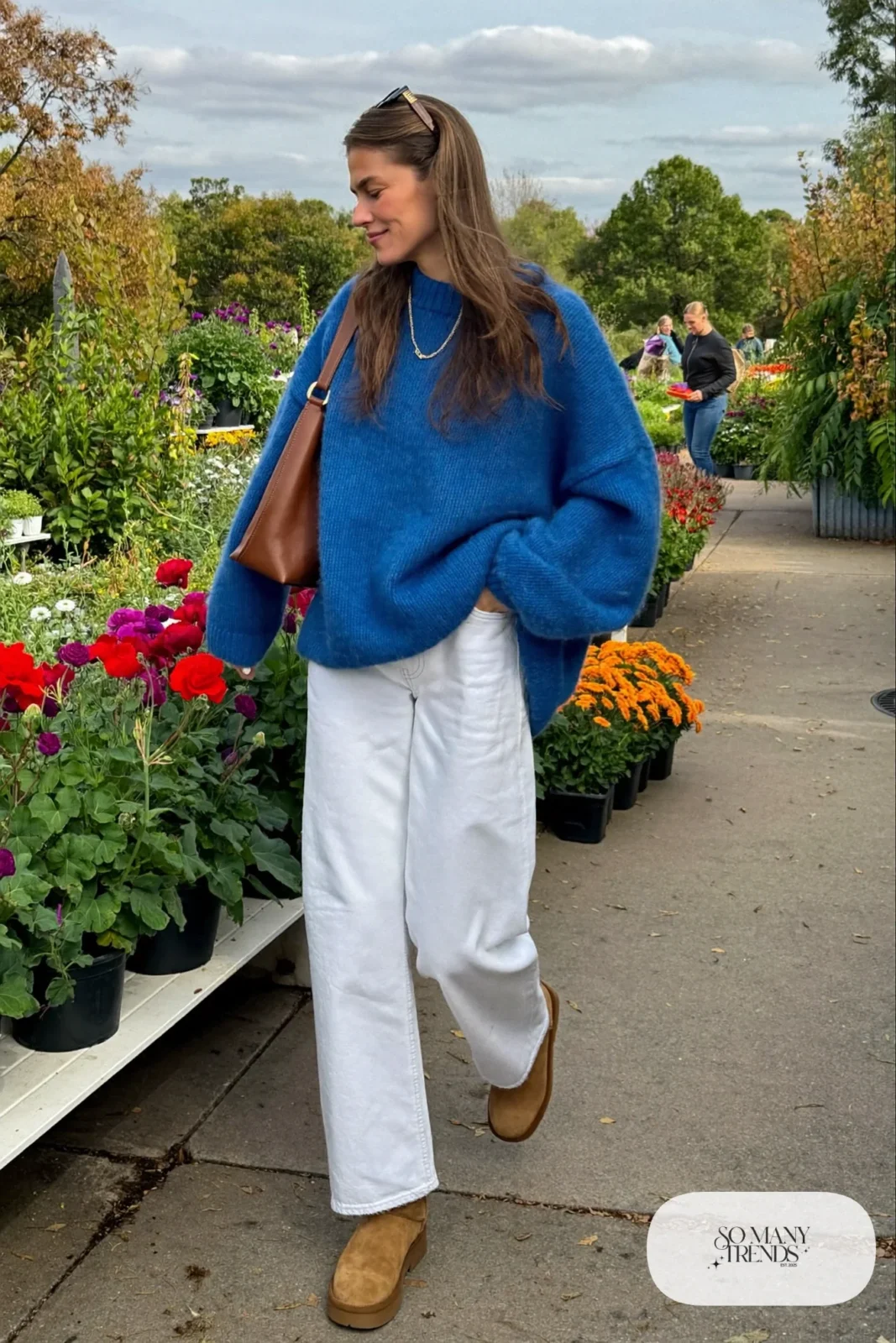 cobalt blue long sweater white straight jeans tan ankle boots brown bag outfit 12