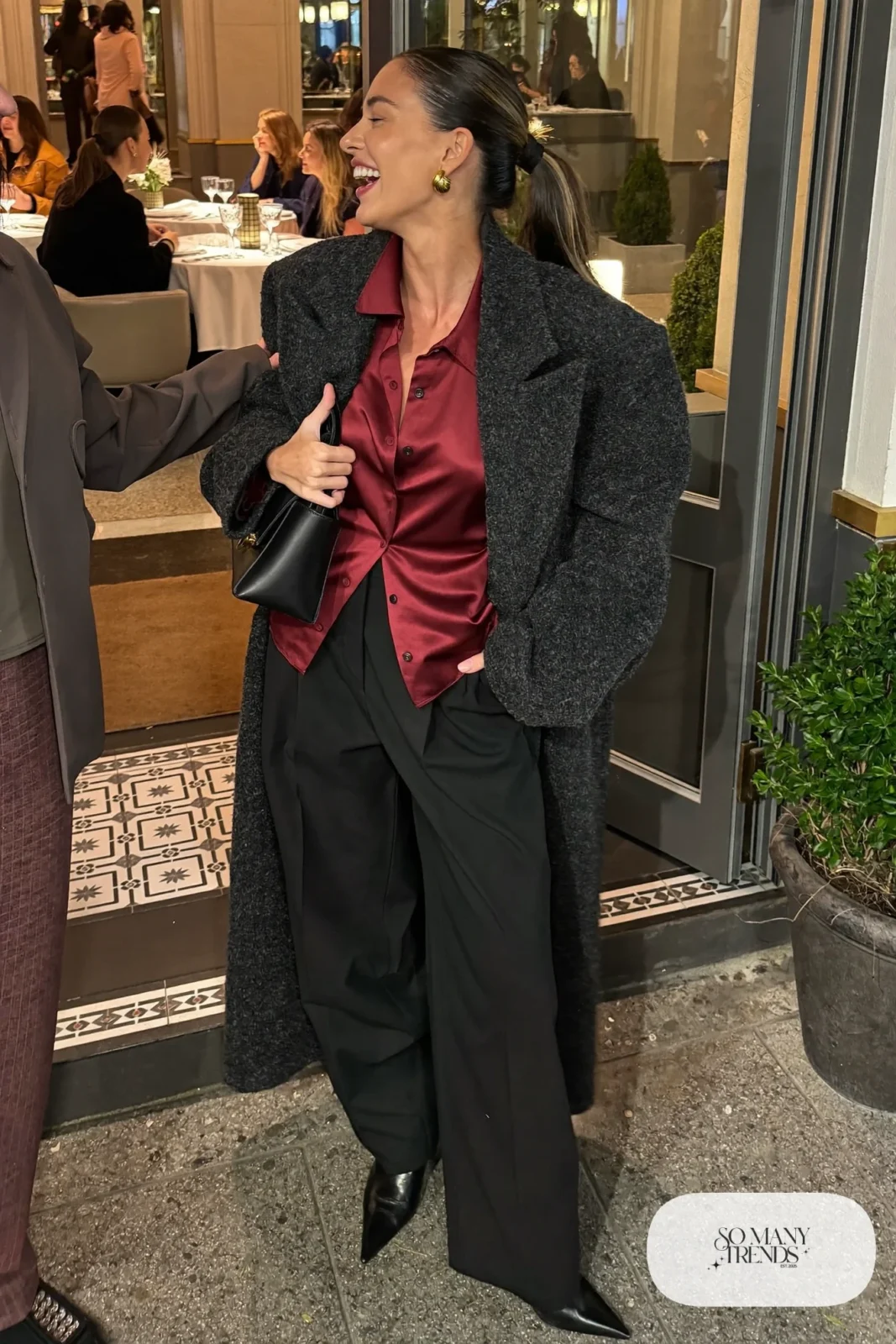 black wide-leg pants burgundy satin blouse black pointed boots long wool coat outfit 8