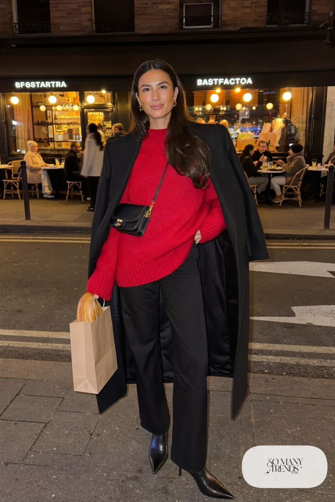 cherry red knit sweater straight black pants black leather boots black wool coat gold earrings outfit 9