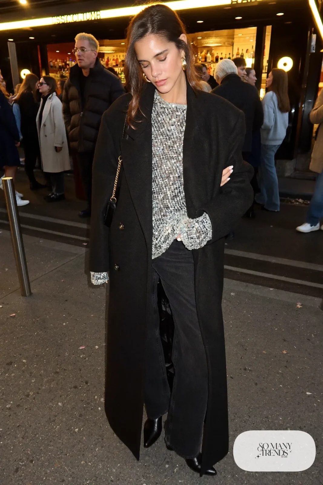 silver sequin long sleeve top black straight jeans long black wool coat black ankle boots small bag outfit 17