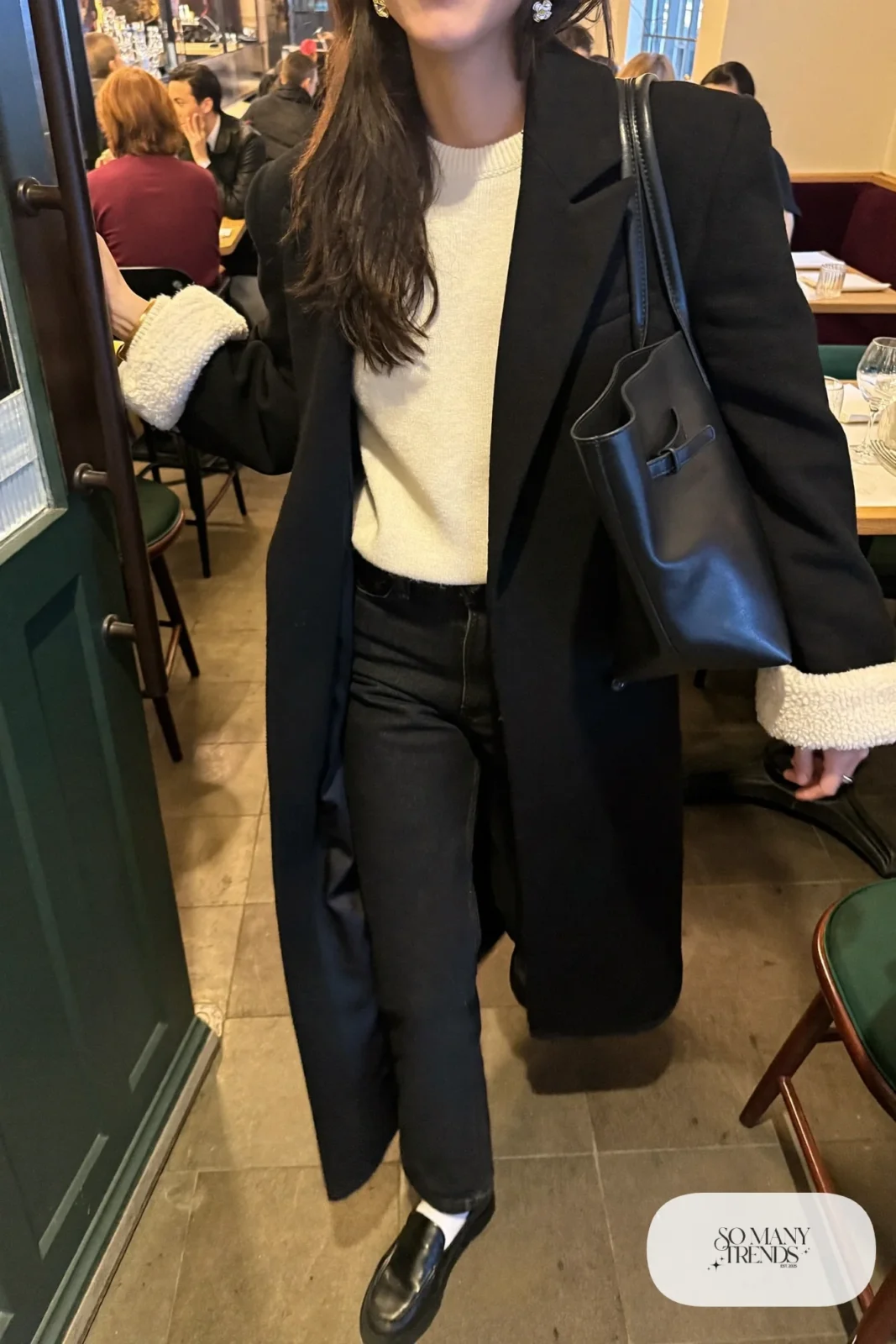 cream fine knit sweater dark straight jeans black wool coat black loafers socks leather tote outfit 18