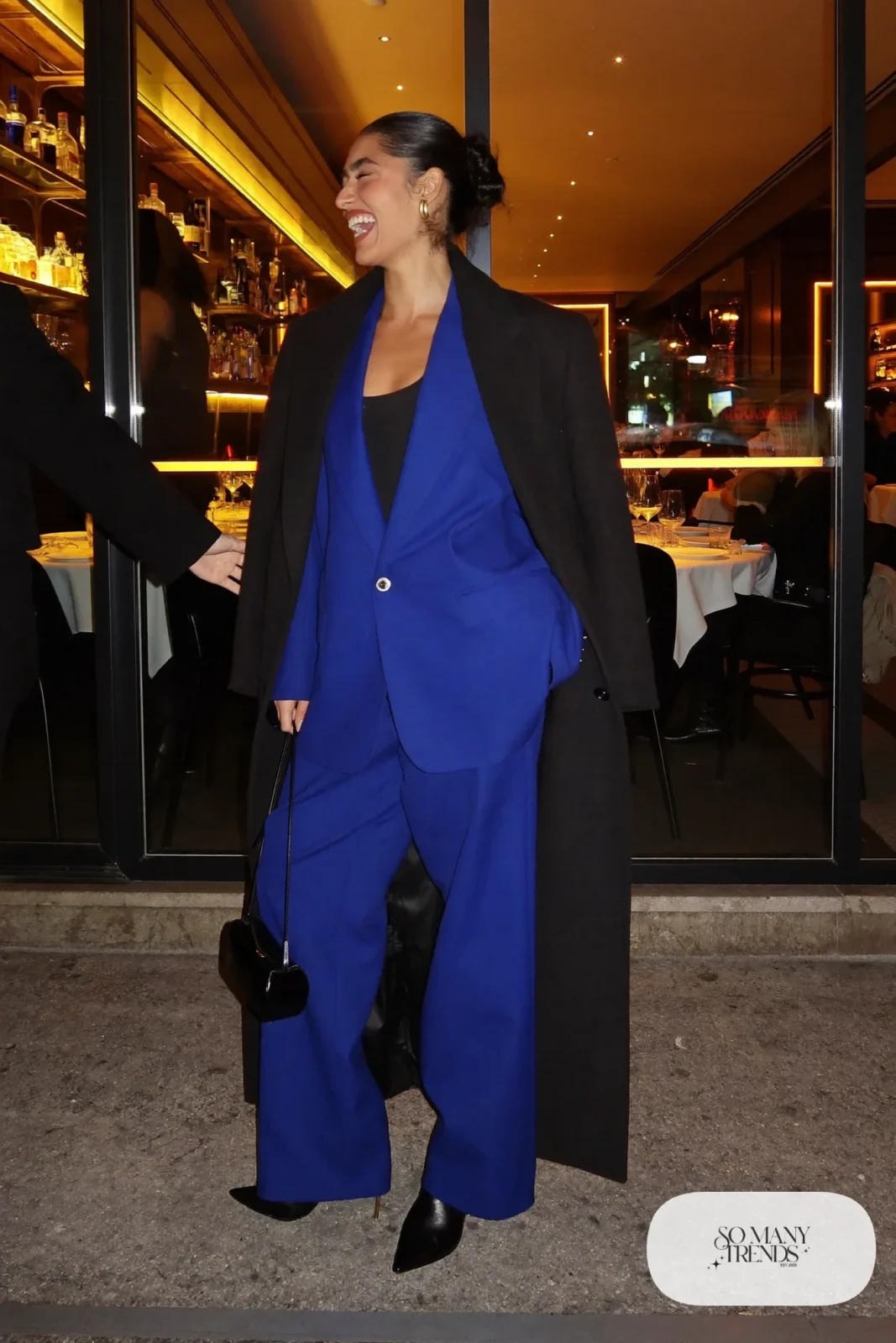 cobalt blue oversized blazer matching wide-leg pants black bodysuit black boots small black bag outfit 29