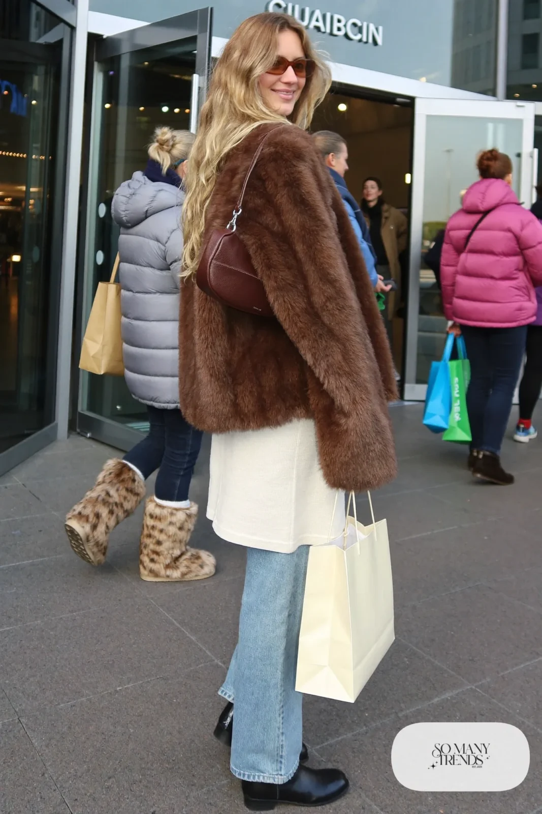 chocolate brown faux fur jacket cream tank straight low-rise jeans black boots baguette bag sunglasses outfit 2