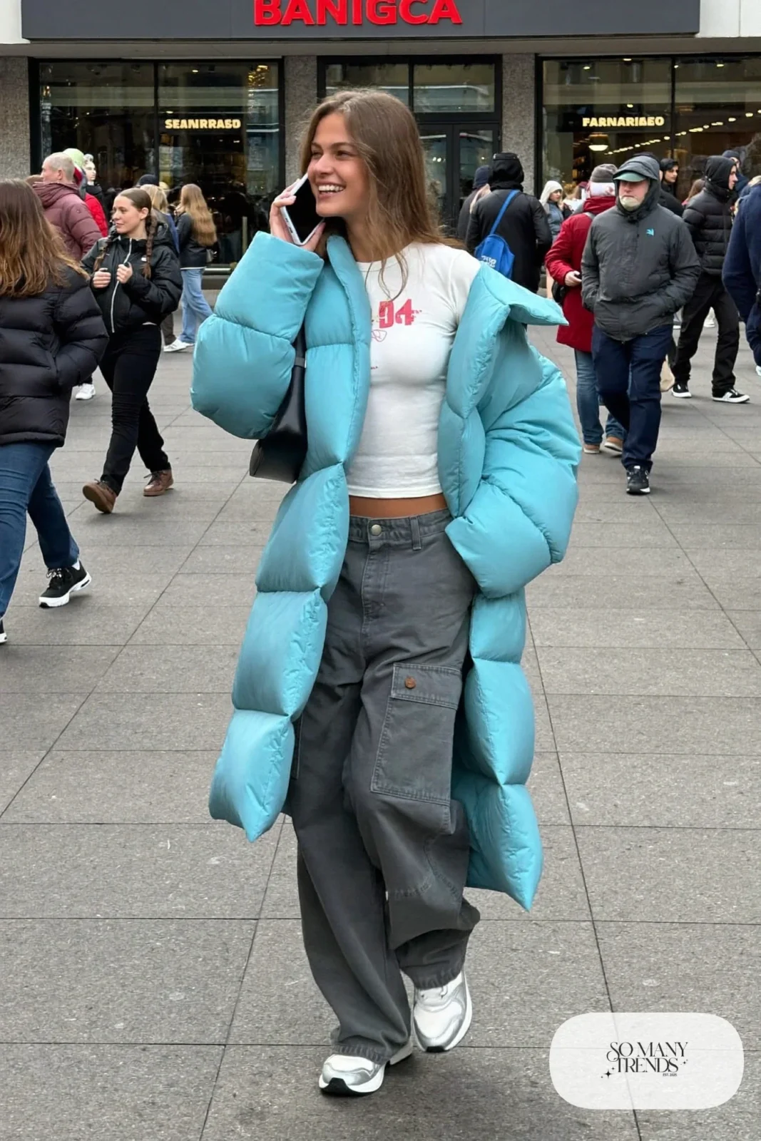ice blue long puffer coat white baby tee gray wide-leg cargo pants chunky sneakers shoulder bag outfit 5