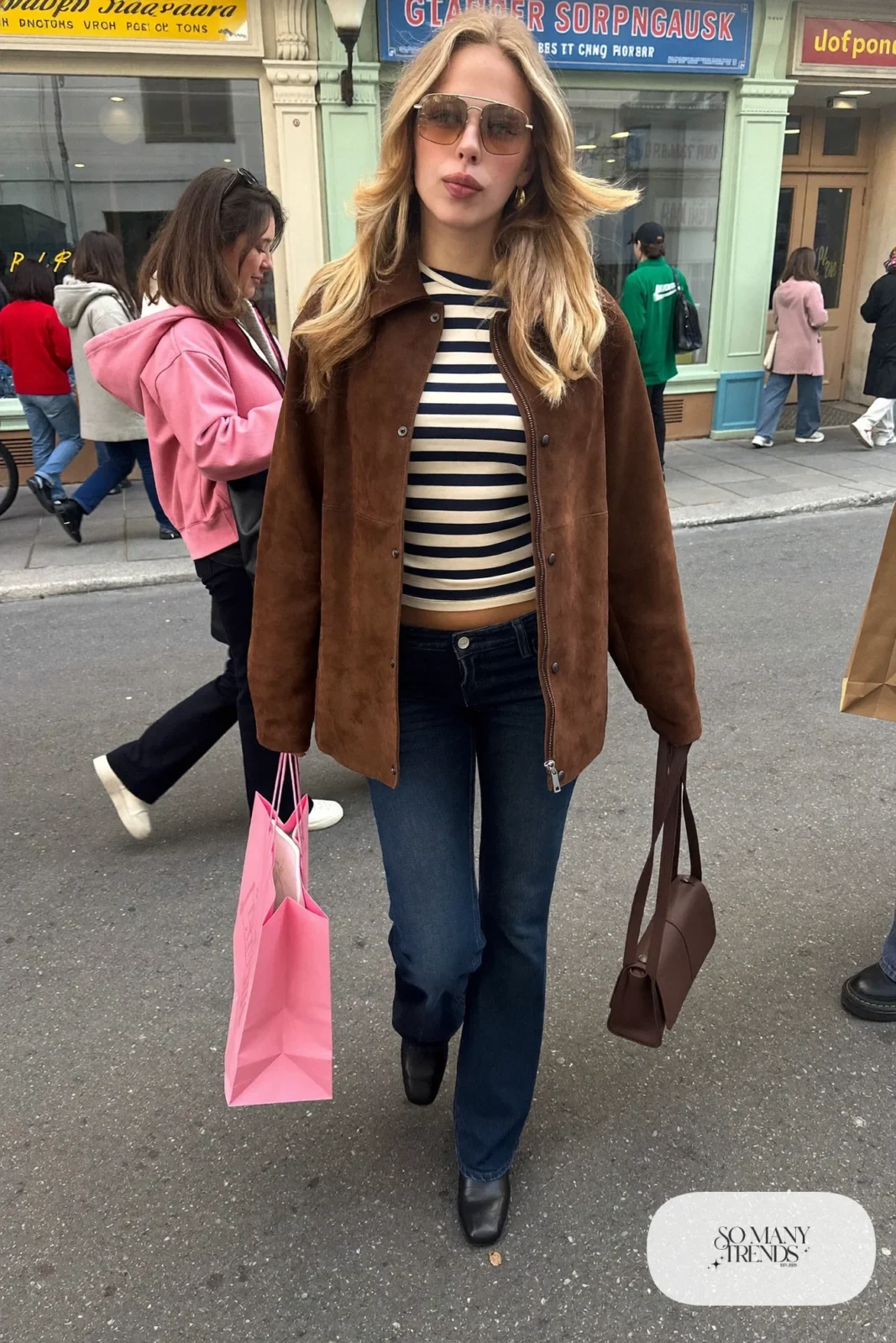 brown suede jacket dark-wash flared jeans striped tee ankle boots shoulder bag sunglasses outfit 20