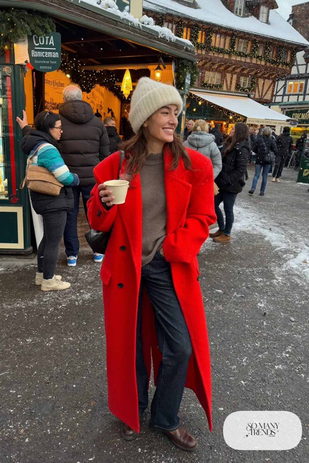 long cherry red wool coat gray knit sweater dark jeans brown boots cream knit hat outfit 20