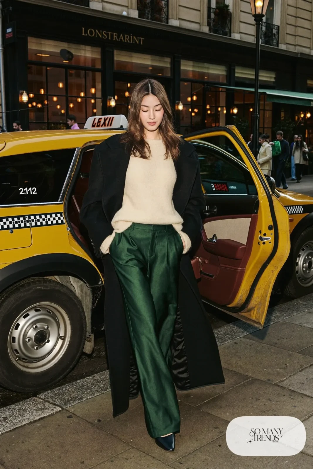 forest green satin wide-leg pants cream cashmere sweater long black coat pointed leather flats outfit 22