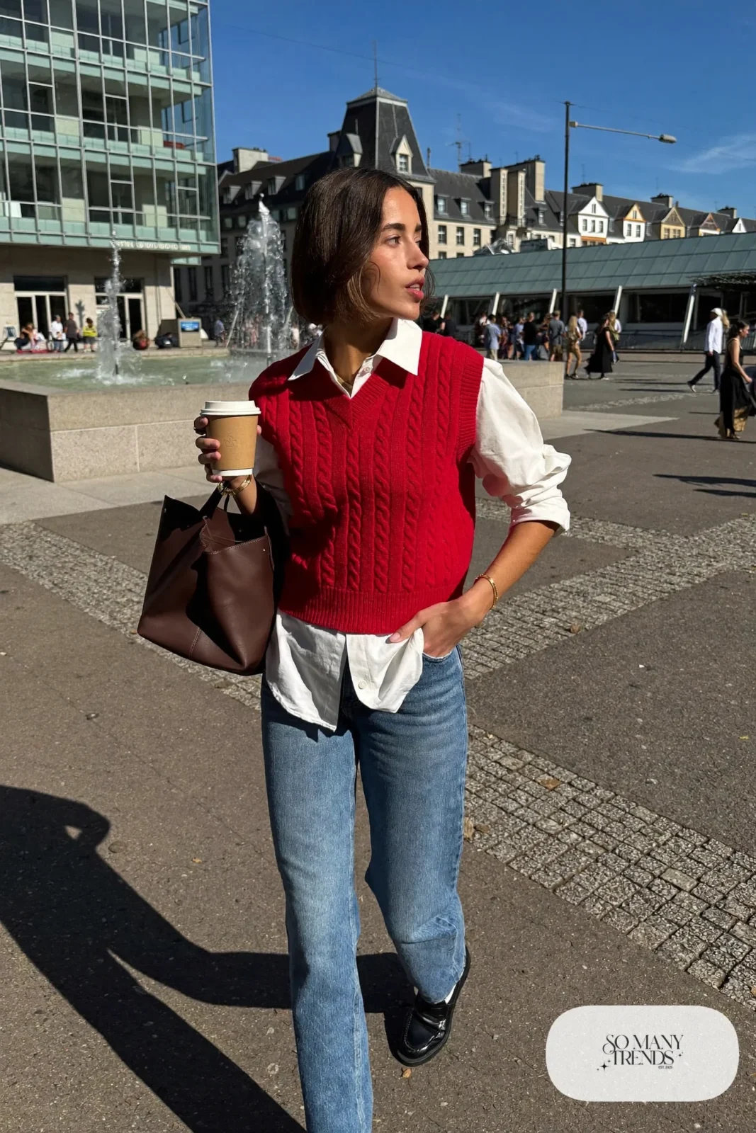 red knit vest white poplin shirt straight blue jeans black loafers white socks leather tote gold watch valentines outfit 25