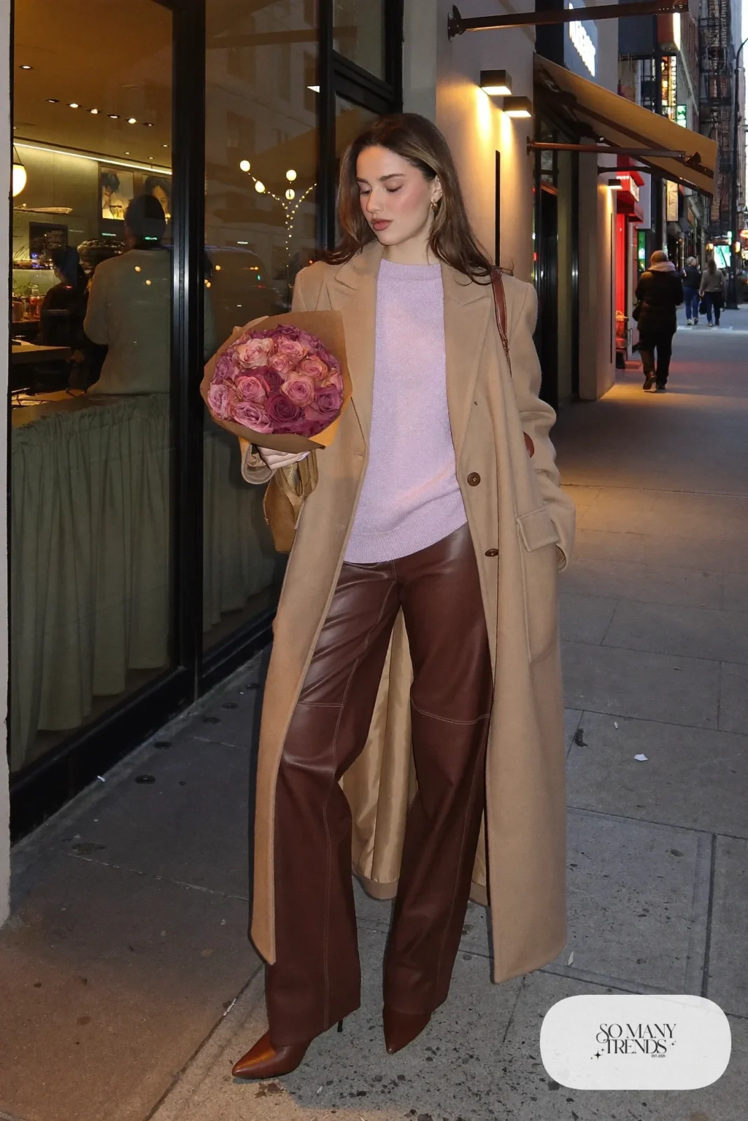 chocolate brown faux leather pants pale pink knit sweater long camel coat pointed boots brown shoulder bag valentines date outfit 29