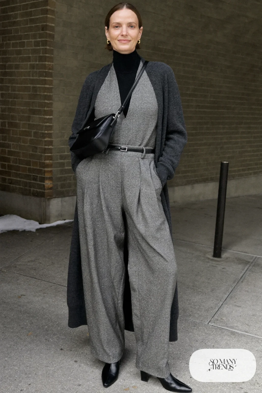 gray flannel wide-leg jumpsuit black turtleneck belt black ankle boots outfit 7
