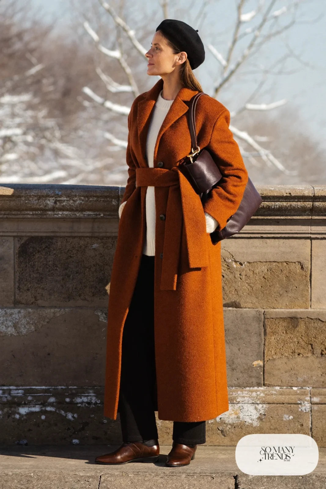 rust wrap coat belted ivory sweater black pants brown boots outfit 8
