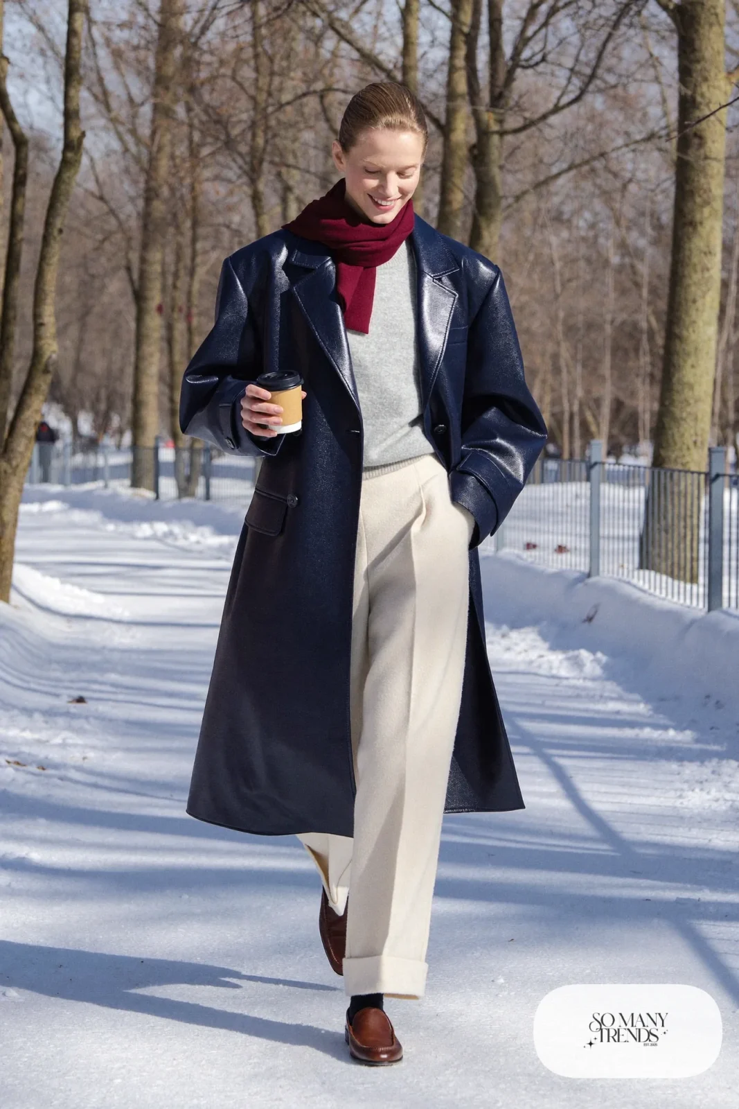long navy peacoat cream wide-leg wool pants brown loafers gray sweater outfit 9